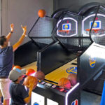 Father and son playing NBA Game Time Commercial Rental Arcade Basketball Game San Jose