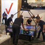 Galaxy Quad Four Player Air Hockey Table during event at San Jose Convention Center.