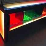 Giant Lite Brite LED table to hold all the supplies from Arcade Party Rental