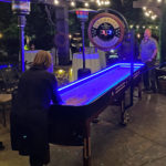 Lighted LED Glow Shuffleboard at house birthday party rental