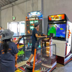 Space Invaders Frenzy Arcade Game with Top Skater Arcade Game at rental party in San Francisco