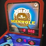 Whack a Manhole shipped to Chicago corporate event made by Arcade Party Rental