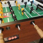 Commercial 4-player foosball table from Tornado for rent Arcade Party Rental