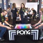 Pong table arcade at a convention from Arcade Party Rental