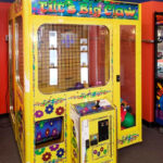 Giant claw crane rental with custom graphics Arcade Party Rental