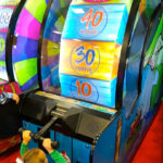 Larger than Life Reel Big Bass Wheel Arcade Party Rental Las Vegas Nevada
