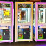 Matching custom claw crane arcade games for a corporate rental in Austin Texas by Arcade Party Rental
