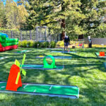 Mini golf outdoor setup with other outdoor games in Palo Alto from Arcade Party Rental