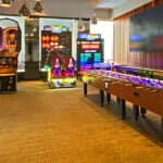 Supersized 12-player LED foosball table with LED NBA Hoops basketball Arcade Party Rental Las Vegas event center