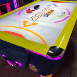 Air FX home Airhockey with LED lit legs and perimeter of playfield for your corporate event from Arcade Party Rental
