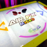 Air FX home LED Air hockey backlit acrylic playing surface from Arcade Party Rental