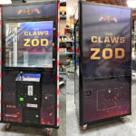 Custom branded claw arcade game for a movie premiere by Arcade Party Rental San Francisco
