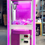 Prize Cube crane game branded for a trade show in Anaheim by Arcade Party Rental.