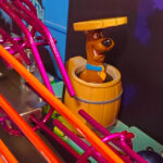 Scooby Doo hiding in the barrel Arcade Party Rental