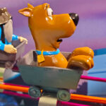 Scooby Doo riding a cart in pinball Arcade Party Rental