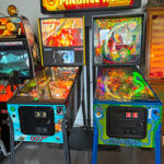 Pinball Alley sign above the pinball machines available for rent from Arcade Party Rental
