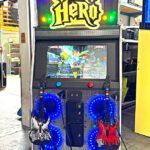 Guitar Hero arcade with custom made marquee branding for corporate party in San Diego from Arcade Party Rental