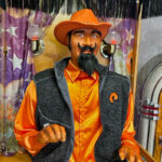 Zoltar fortune teller with unique custom dress to match the theme of the event in Las Vegas from Arcade Party Rental Los Angeles