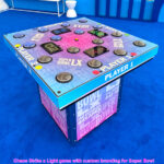 Chaos Strike a Light arcade game with custom branding rental at Super Bowl tailgate party at Santa Clara from Arcade Party Rental San Francisco