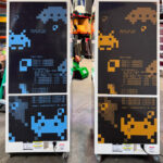 Matching Wonder Claw games with complete corporate branding on all sides ready a convention in San Francisco by Arcade Party Rental