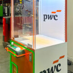 Simple colorful and attractive corporate branding on our new Wonder Claw available for trade shows from Arcade Party Rental