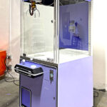 Wonder Claw with custom corporate branding for maximum attraction and client interaction from Arcade Party Rental
